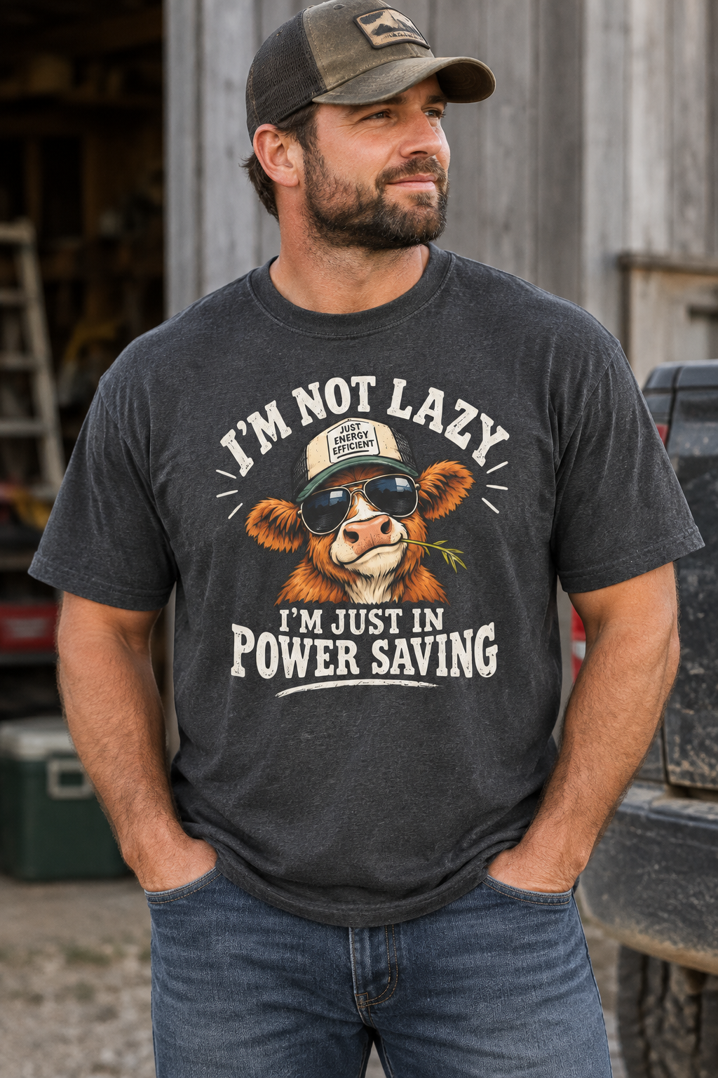 Adult man wearing a dark masculine funny cow power-saving T-shirt